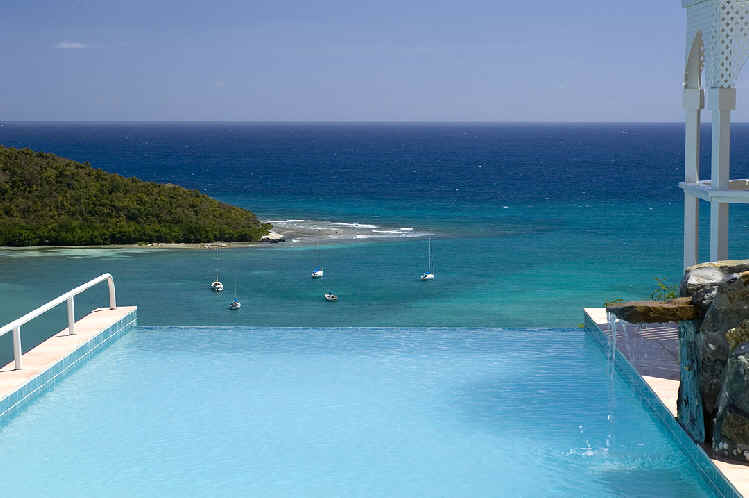 Infinity edge pool with a 30-foot drop, offering a stunning view of the ocean beyond.